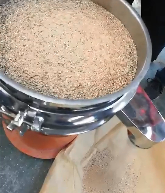 sieving sesame seeds